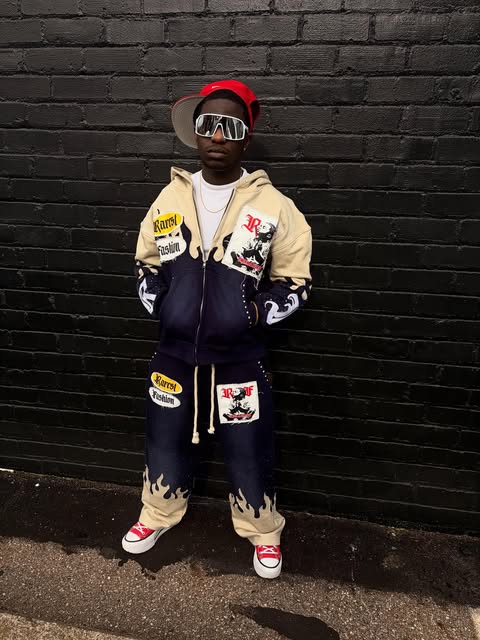 RAREST Fashion CEO wearing the cream and black collection